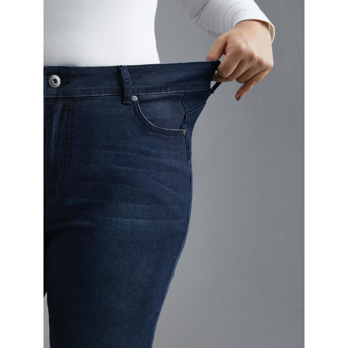 Plus Size Booty-Lifting Skinny Fit Mid-Rise Jeans Women Denimindigo Elegant Button Medium stretch Slanted pocket Jeans BloomChic 12/L Product Image