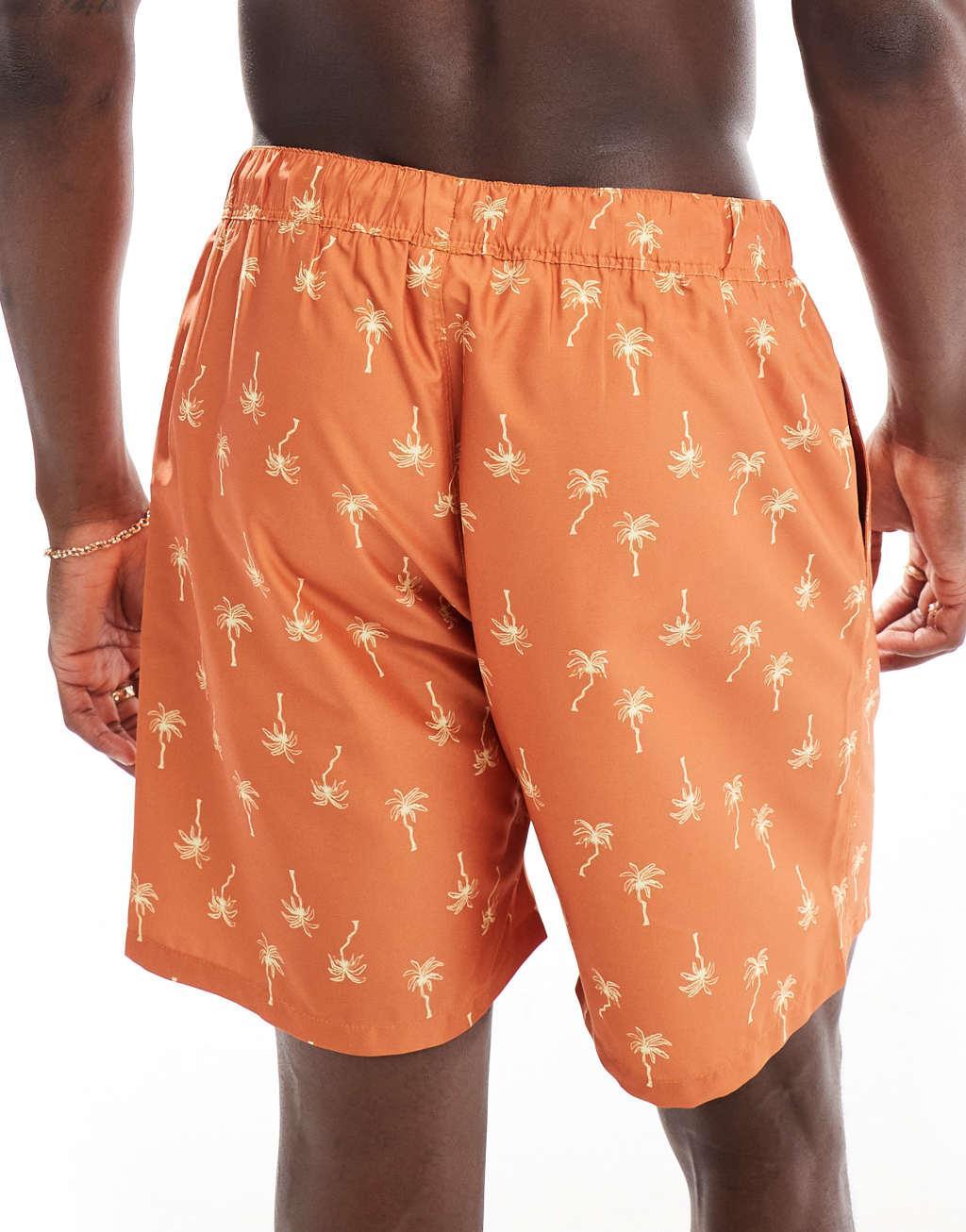 ASOS DESIGN swim shorts in mid length in orange palm tree print  Product Image