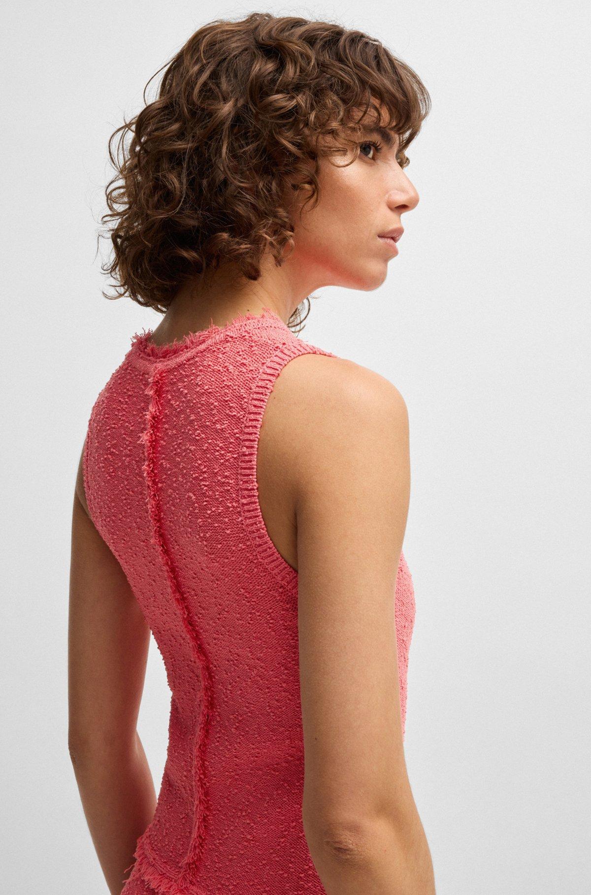 Sleeveless knitted dress with fringe trims Product Image