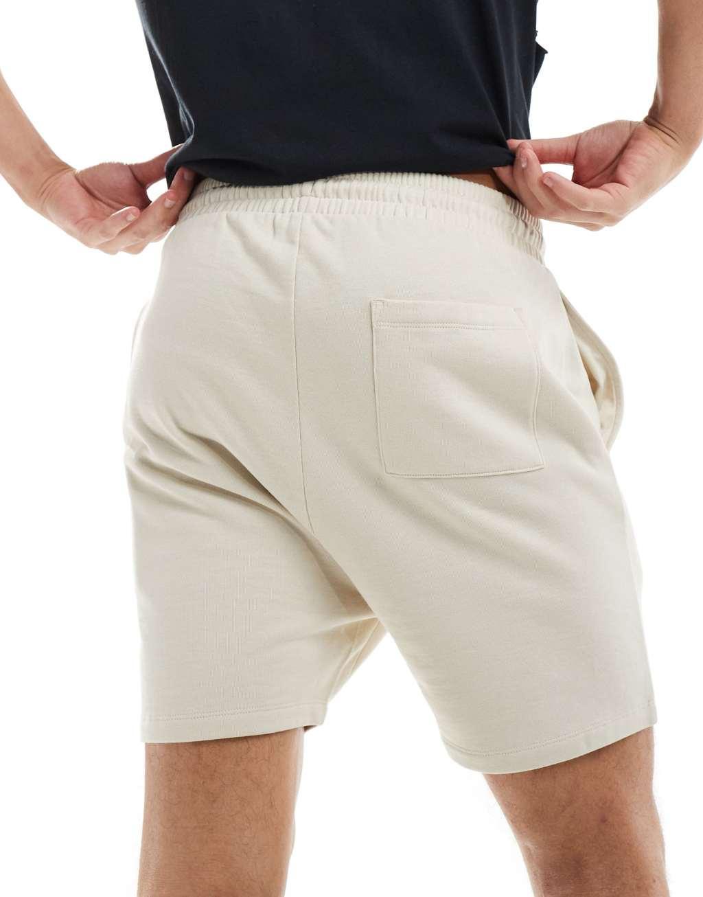 ASOS DESIGN skinny shorts in beige  Product Image