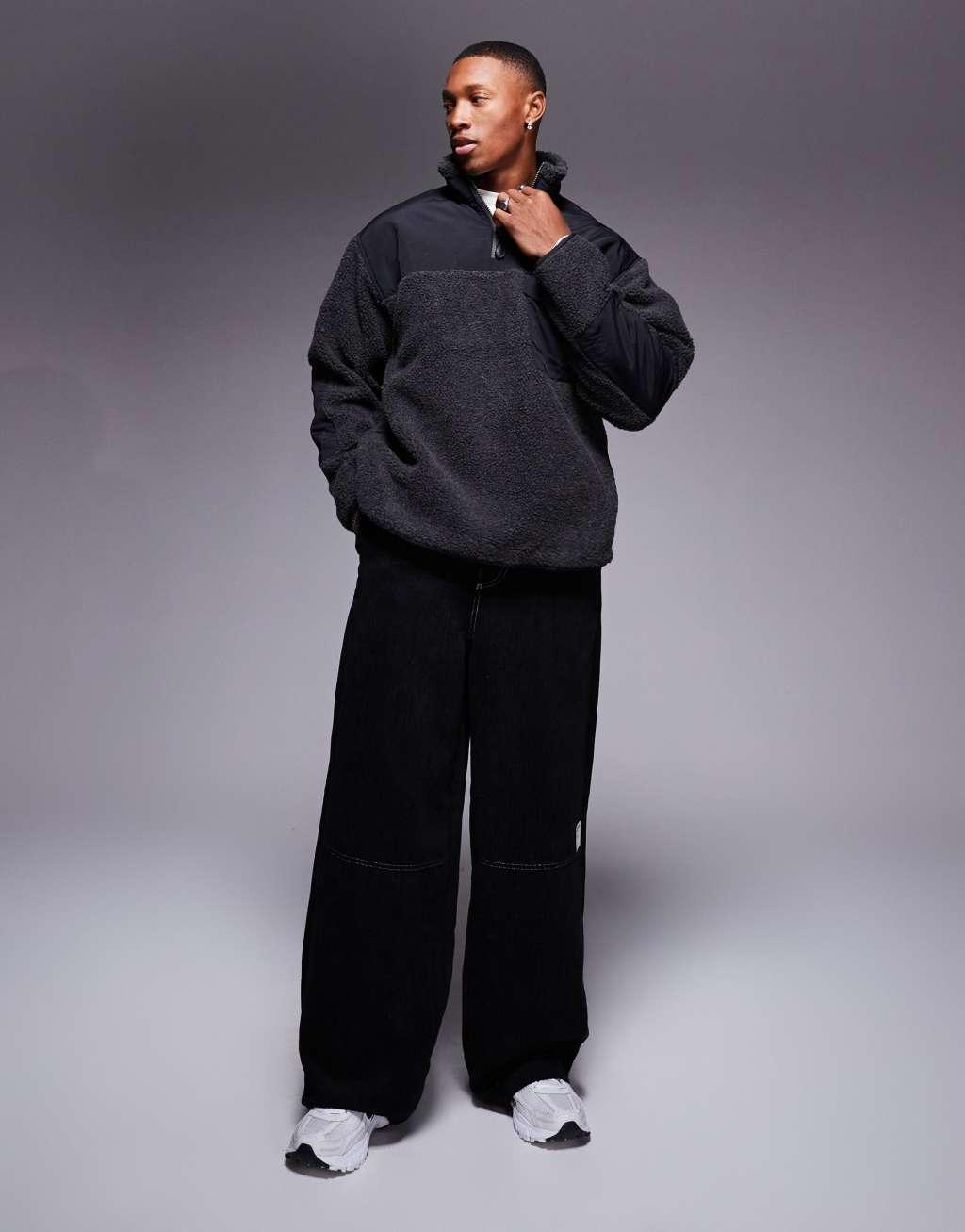 ASOS DESIGN oversized borg half zip sweatshirt with contrast nylon detail in black Product Image