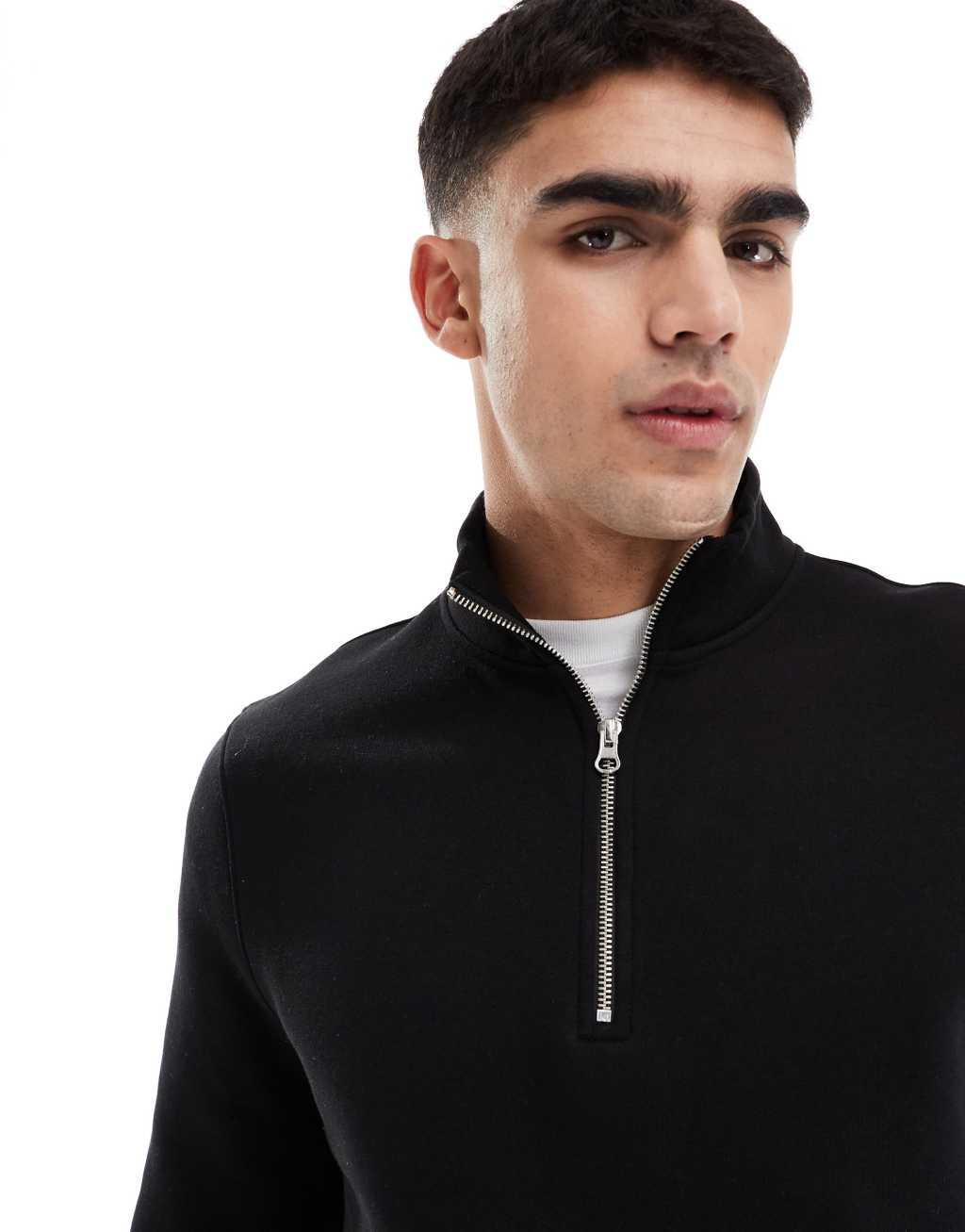 ASOS DESIGN quarter zip sweatshirt in black Product Image