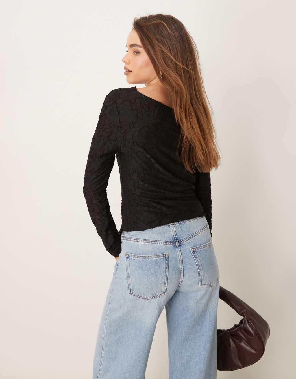 Gina Tricot jersey jacquard off shoulder top with asymmetric hem in black Product Image