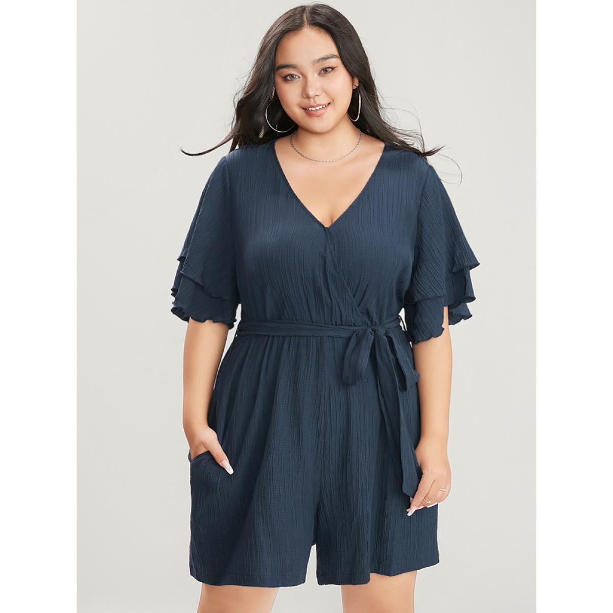 Plus Size Navy Plain Surplice Neck Ruffle Sleeve Pocket Belted Romper Women Elegant Short sleeve V-neck Dailywear Loose Jumpsuits BloomChic 12/L Product Image