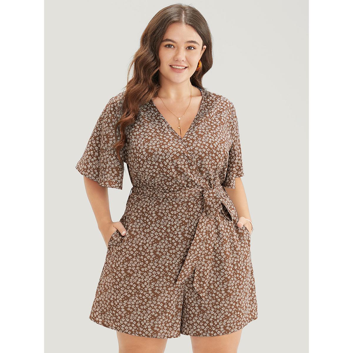 Plus Size Chocolate Ditsy Floral Ruffle Wrap Pocket Belted Romper Women Elegant Short sleeve V-neck Dailywear Loose Jumpsuits BloomChic 30/6X Product Image