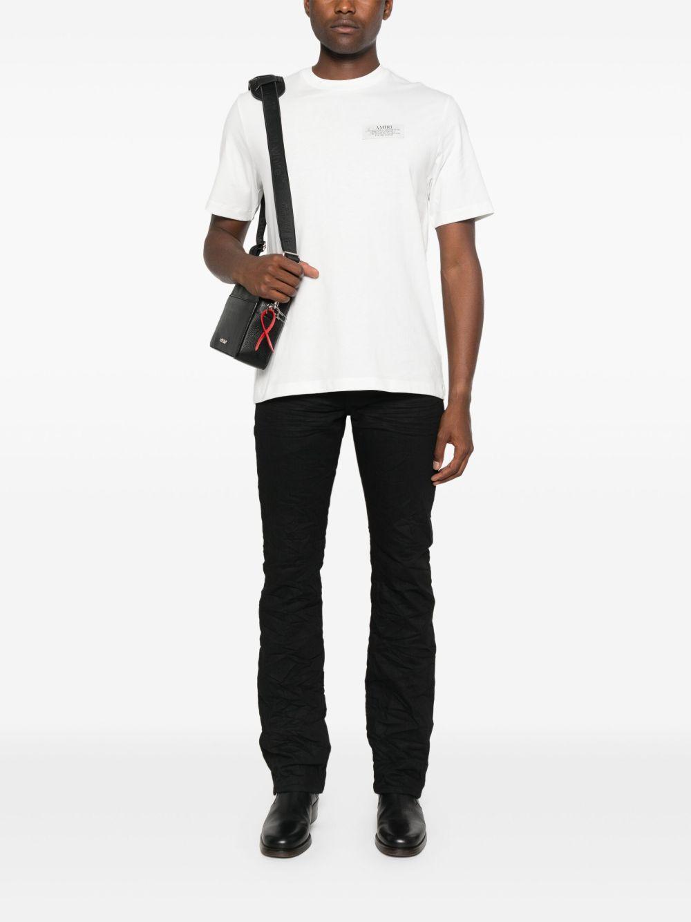 AMIRI Black Crewneck T-shirt With Logo Lettering On Front And Rear Product Image