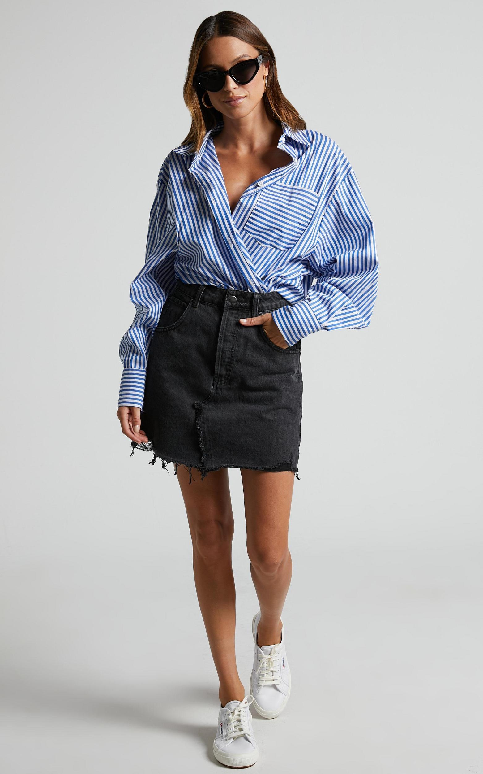 Pieta Mini Skirt - Recycled Cotton Raw Hem Denim Skirt in Washed Black Product Image