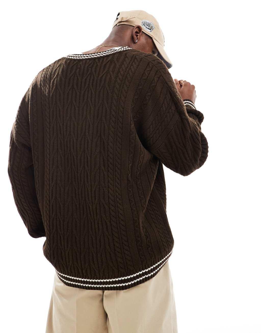 ASOS DESIGN oversized cable knit cricket sweater in brown with cream tipping Product Image