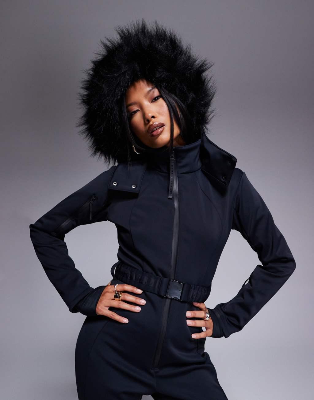 4505 Petite Ski belted ski suit with slim kick legs and faux fur hood in black  Product Image