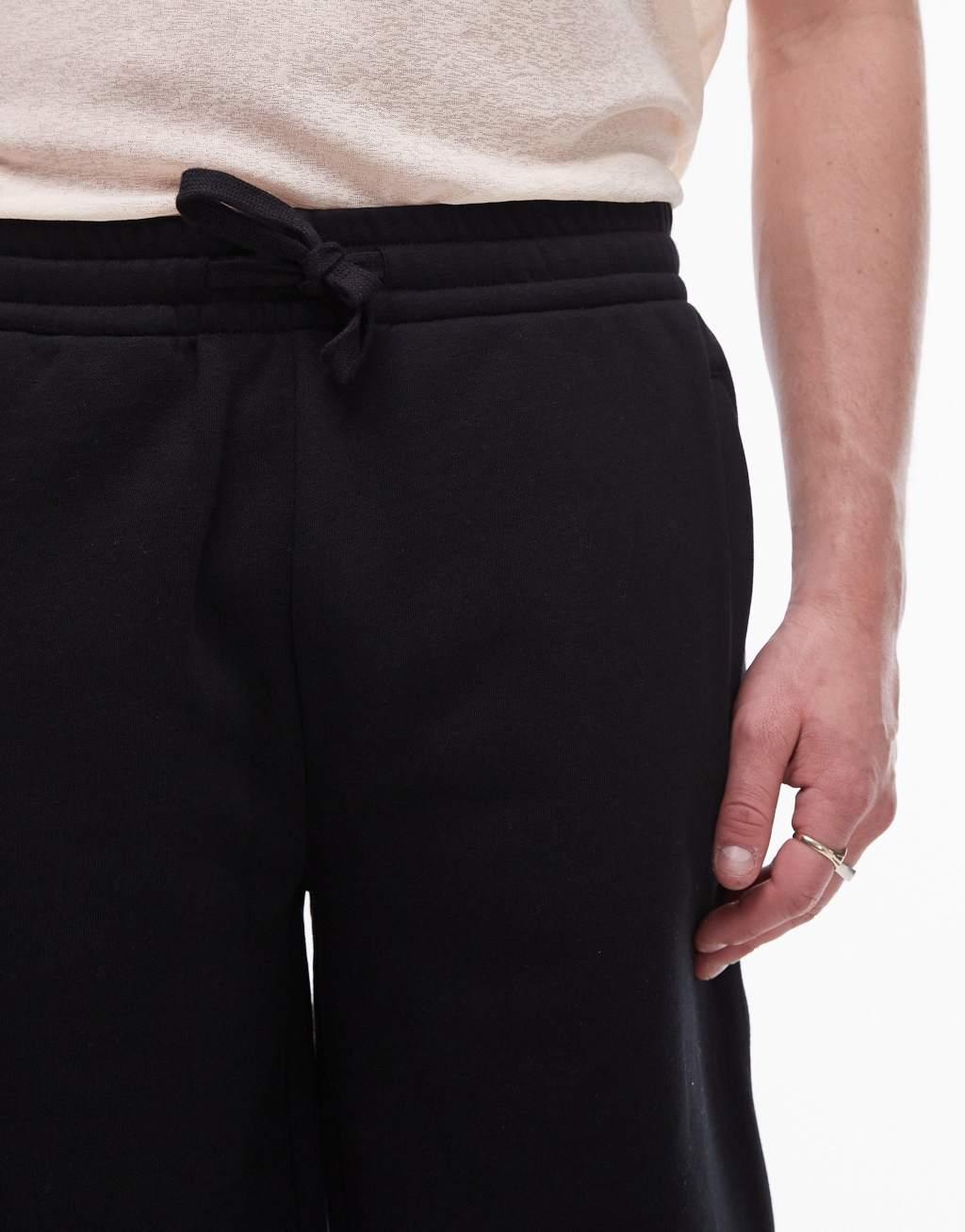 Topman premium heavyweight oversized jersey shorts in black Product Image