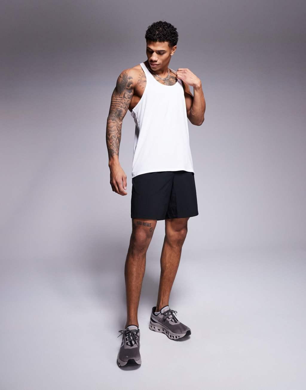 4505 Icon performance jersey quick dry stringer tank top in white Product Image