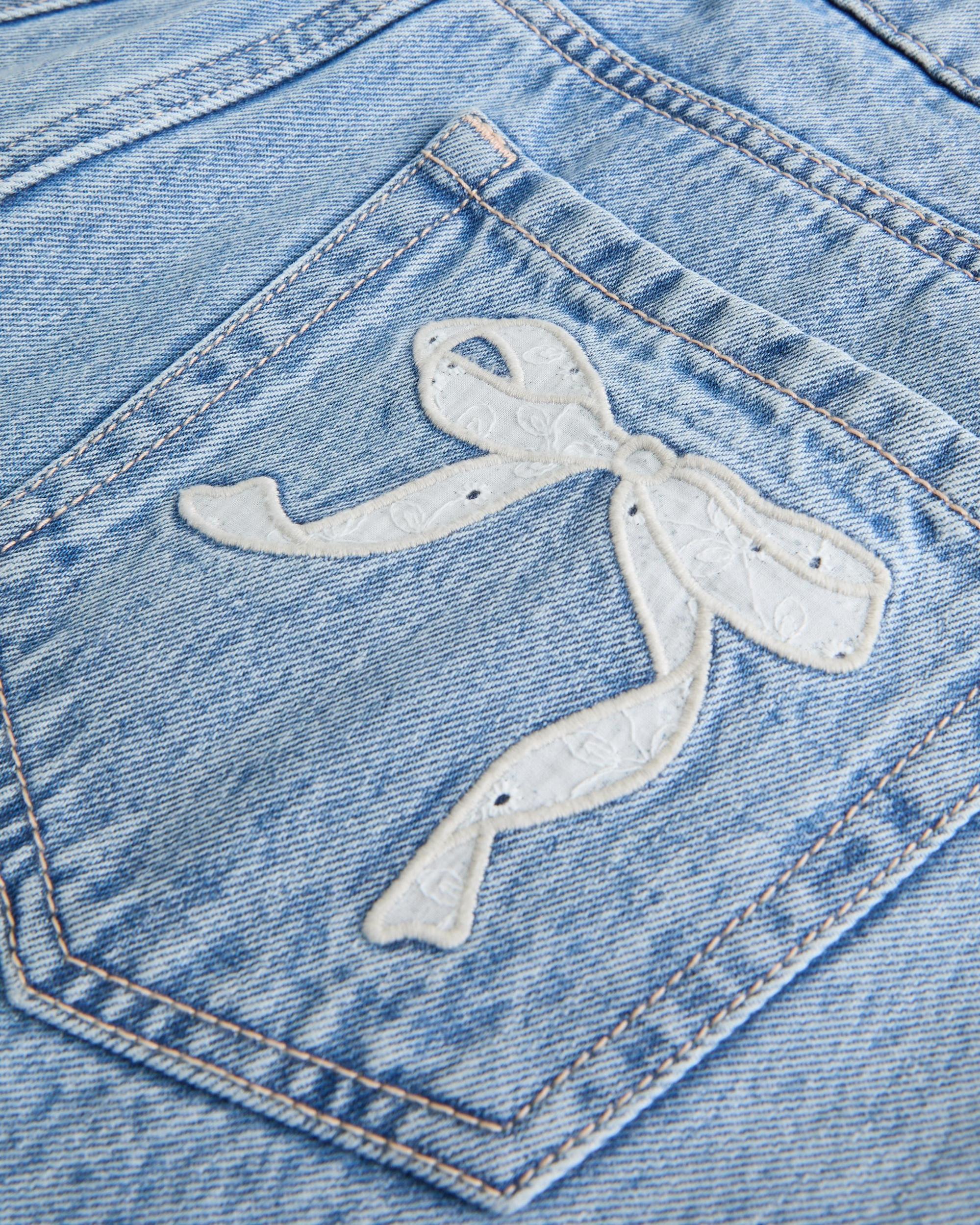 Low-Rise Light Wash Denim Mini Skort Product Image