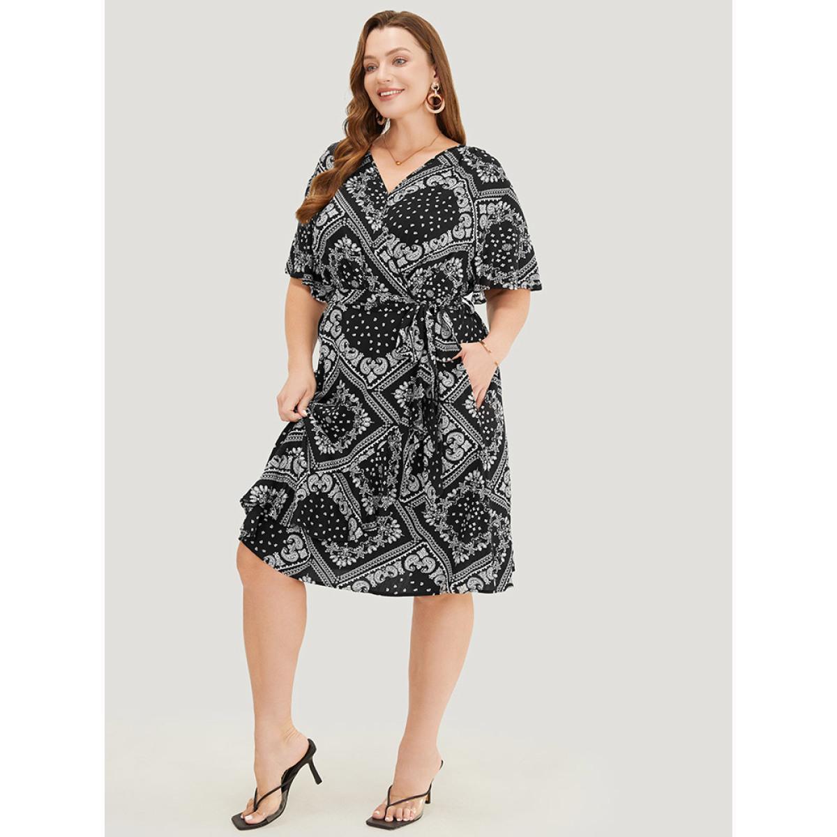 Plus Size Paisley Print Pocket Belted Wrap Flutter Sleeve Dress BlackFlower Women Vacation Wrap V-neck Short sleeve Curvy Knee Dress BloomChic 10/M Product Image