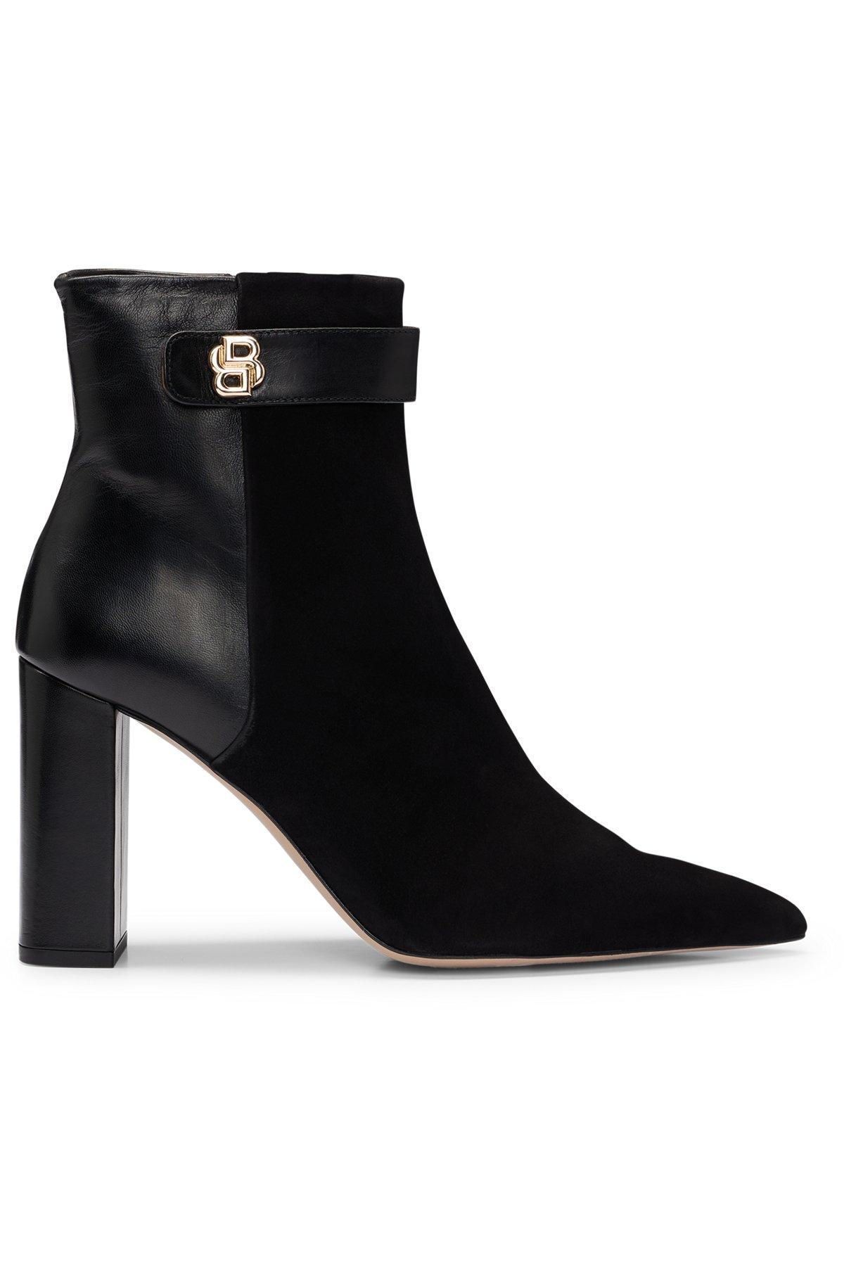 Block-heel ankle boots in suede and leather Product Image