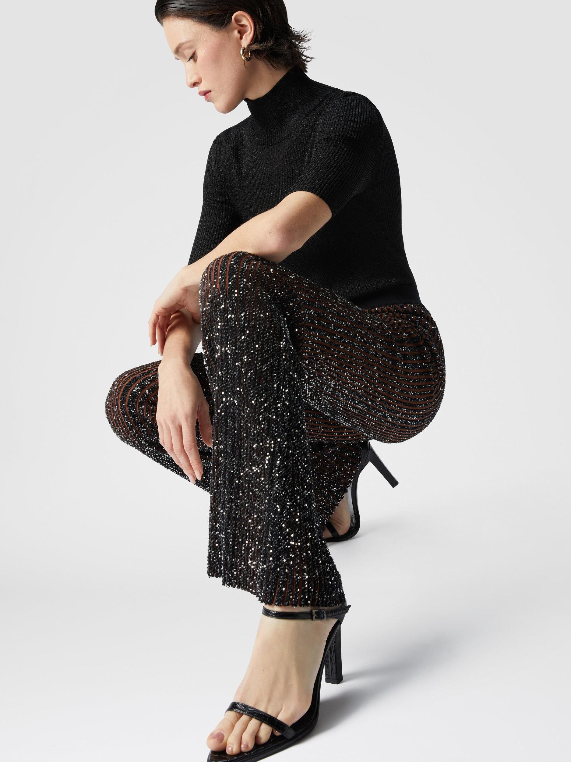 Ribbed stretch flared trousers with sequins Product Image