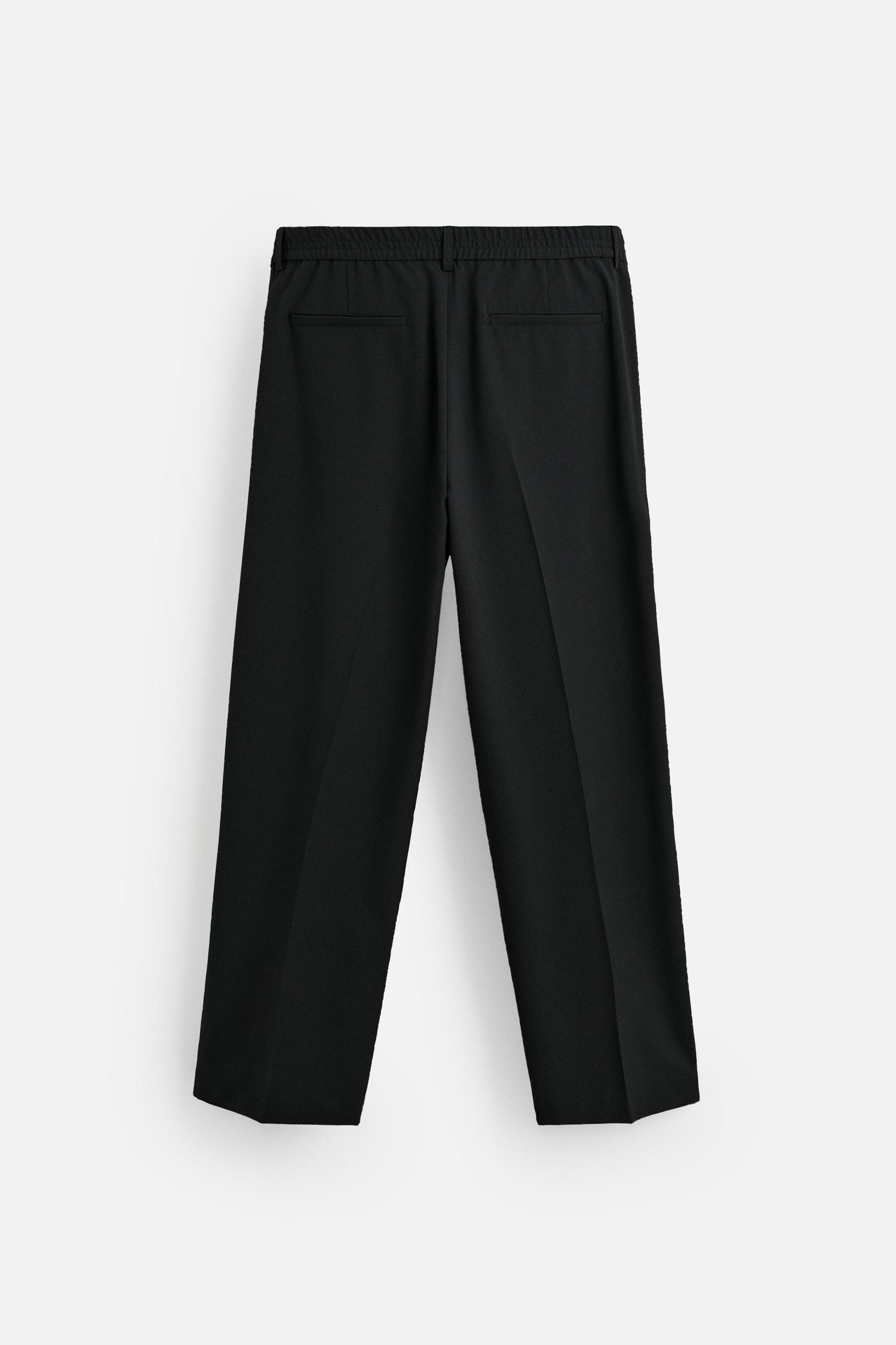PLEATED WIDE FIT PANTS Product Image