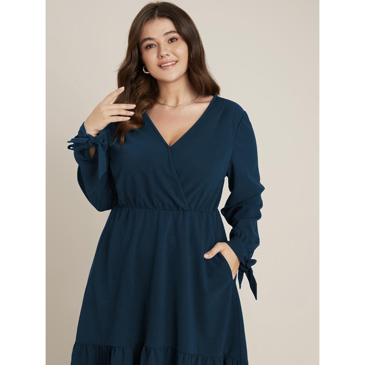 Plus Size Solid Knotted Sleeve Pocket Wrap Ruffle Asymmetrical Hem Dress Aegean Women Office Plain V-neck Long Sleeve Curvy Midi Dress BloomChic 28/5X Product Image