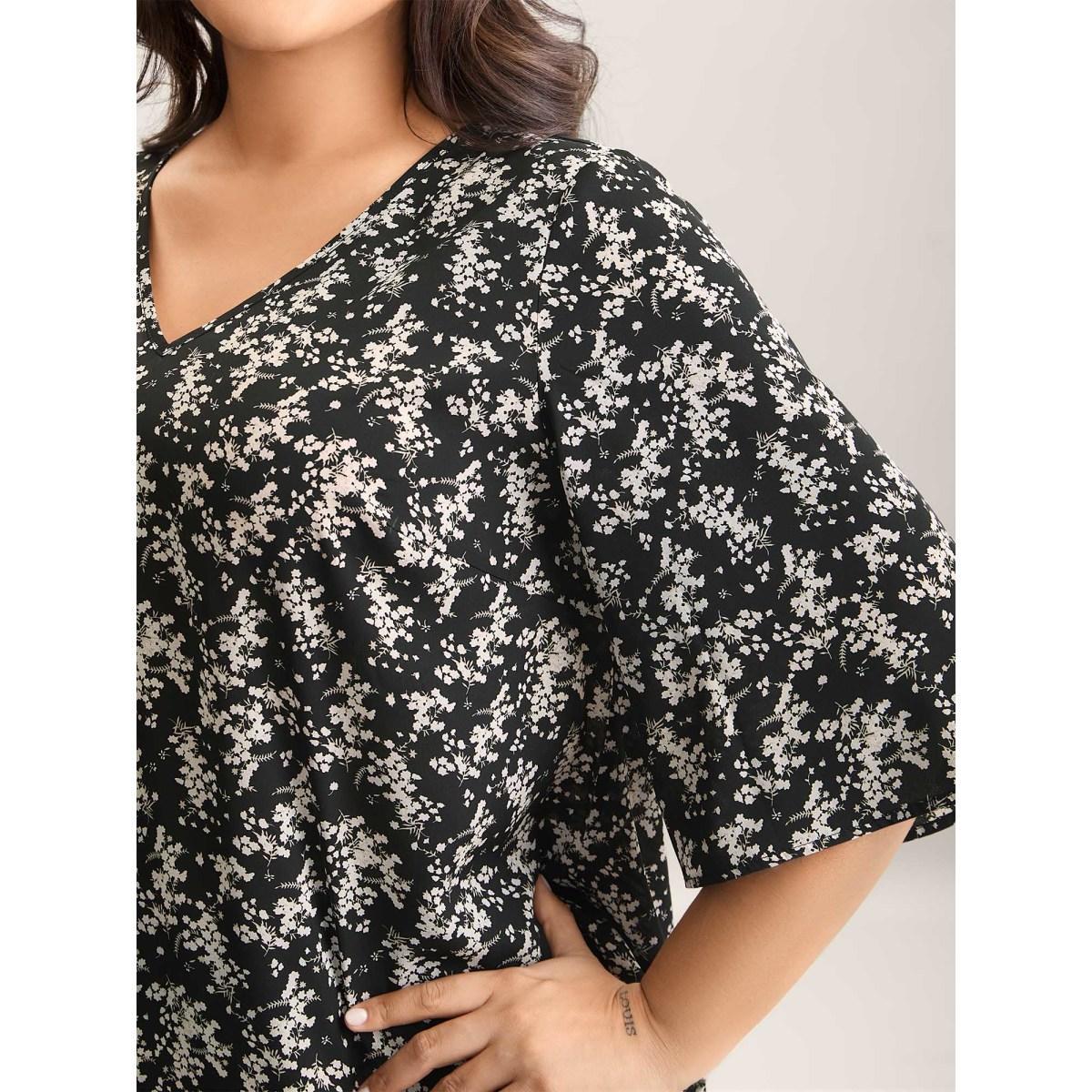 Plus Size Black Floral Print Curvy Hem V-Neck Shirt Women Resort Elbow-length sleeve V-neck Vacation Blouses BloomChic 18-20/2X Product Image