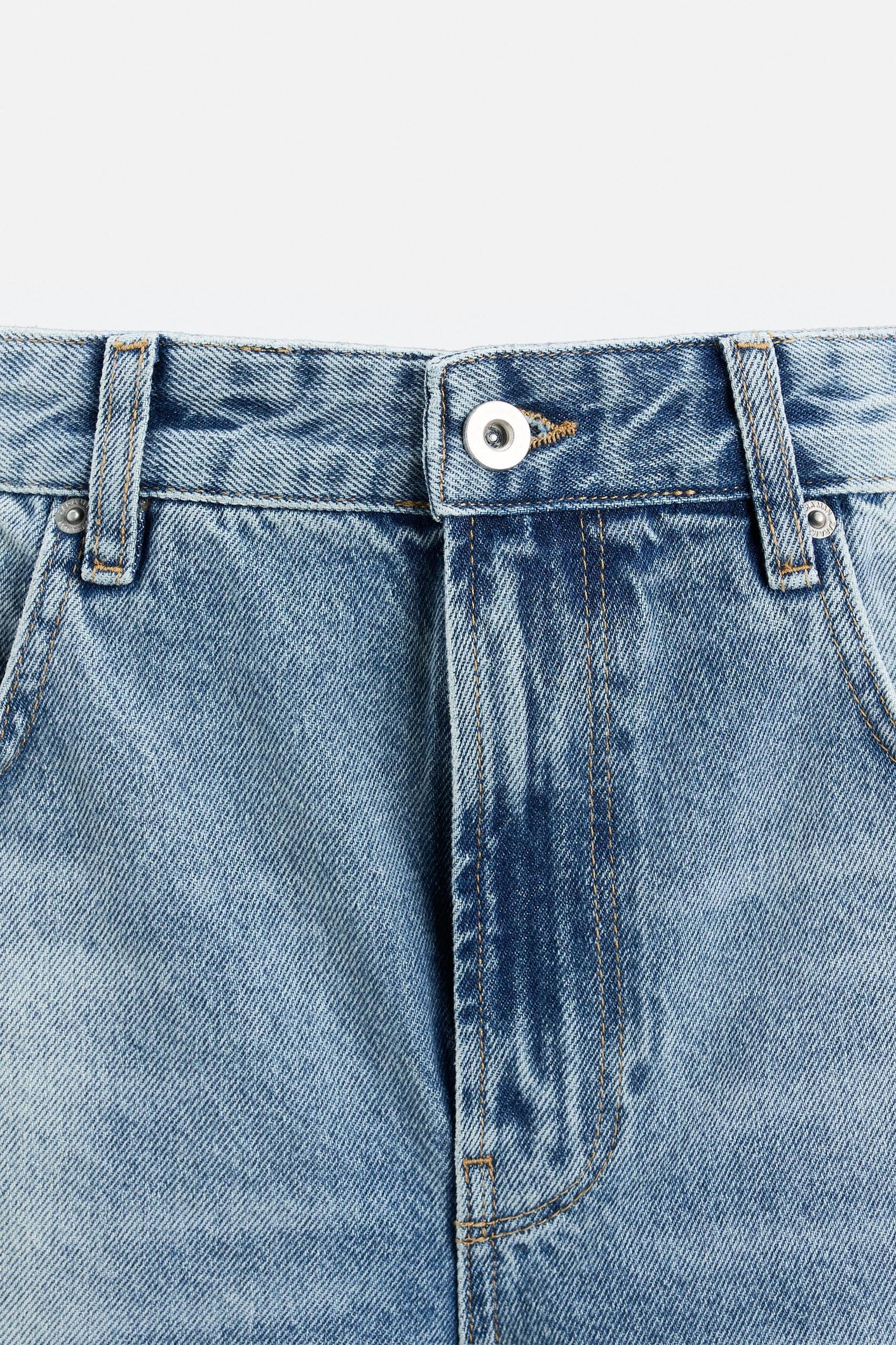 RIPPED FLARE FIT JEANS Product Image