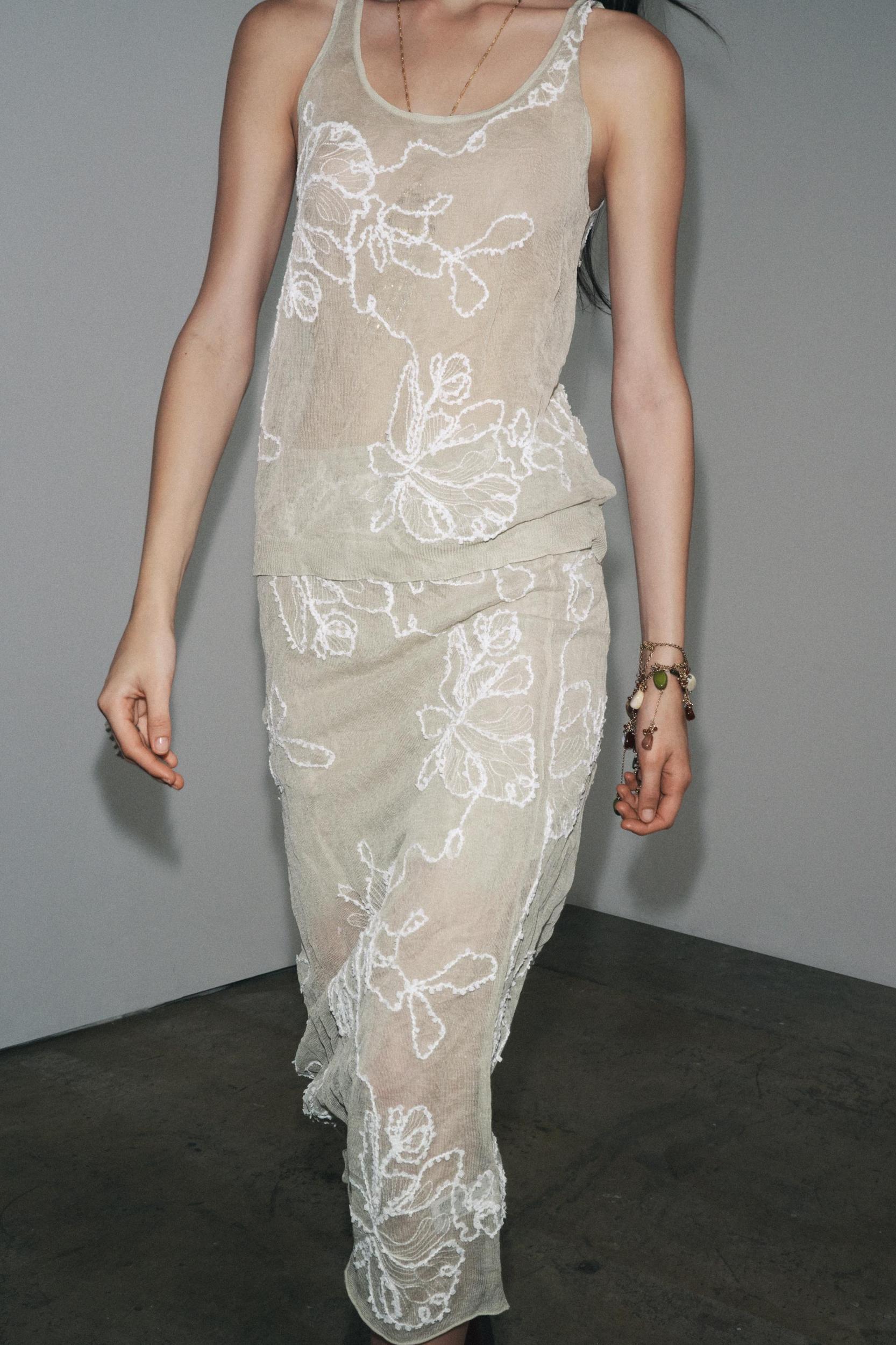 SEMI-SHEER STRUCTURED KNIT TOP Product Image