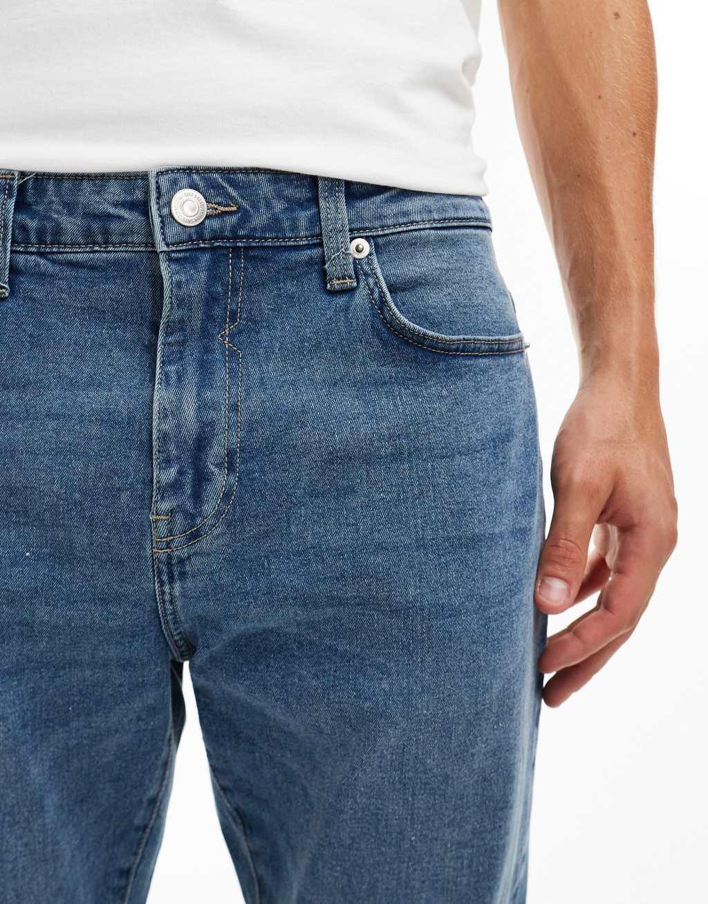 ONLY & SONS slim tapered fit jeans in mid blue wash Product Image