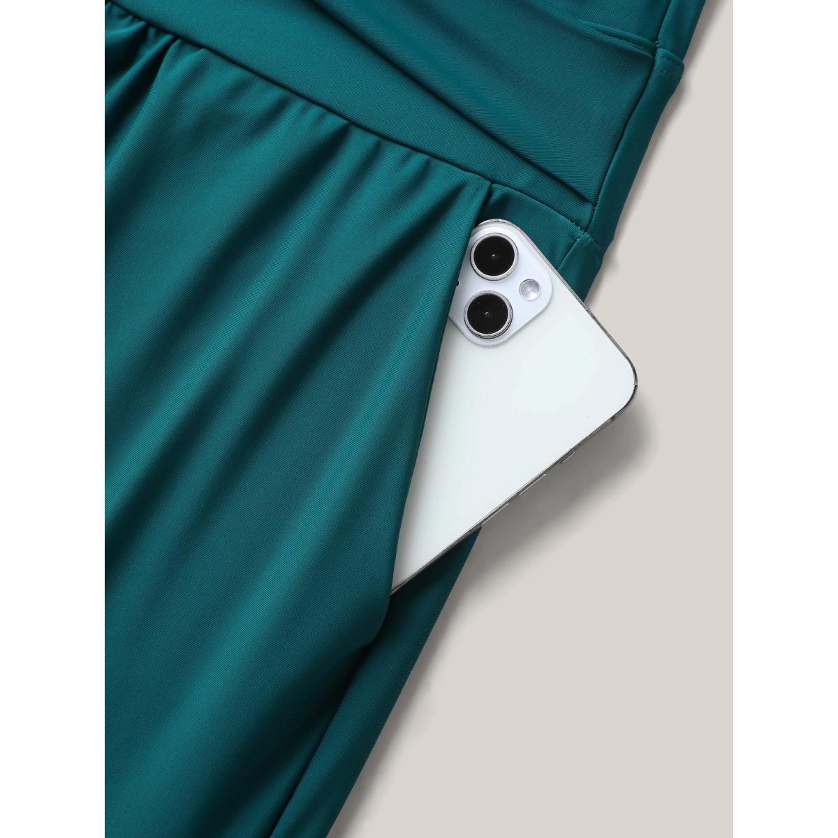 Plus Size Twist Front Pockets Swim Romper Women's Swimwear Cyan Beach Twist Curve Bathing Suits High stretch One Pieces BloomChic 28/5X Product Image
