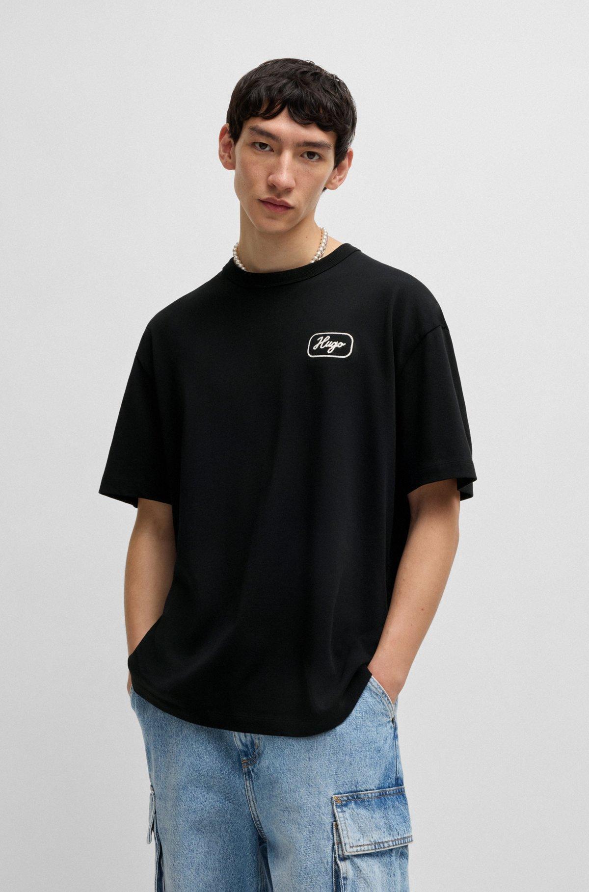 Loose-fit T-shirt in cotton with racing artwork Product Image
