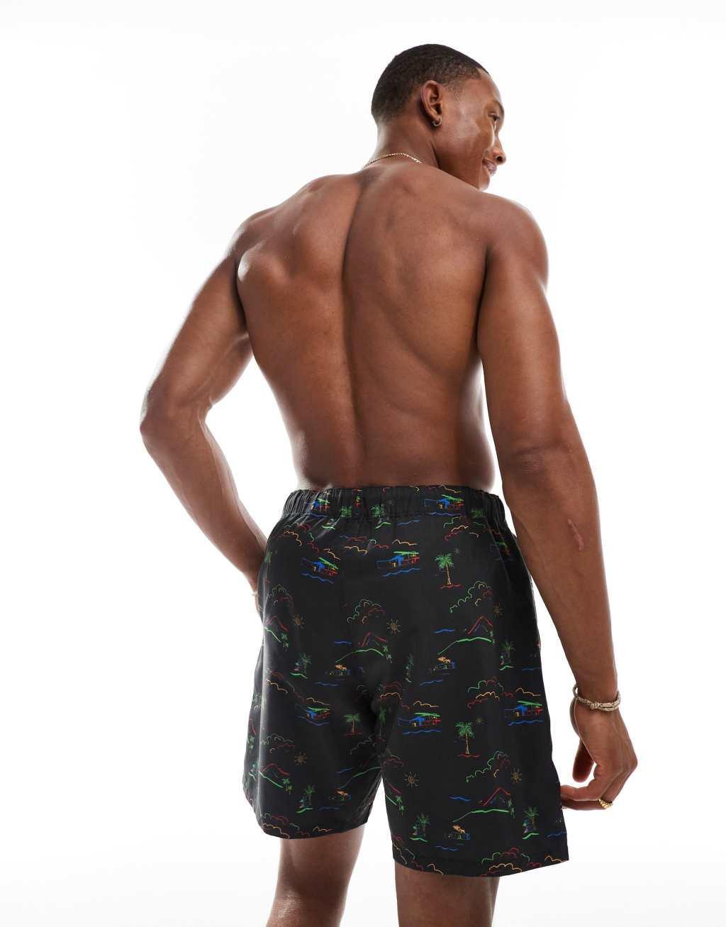 ASOS DESIGN swim shorts in mid length in black hawaiian print Product Image