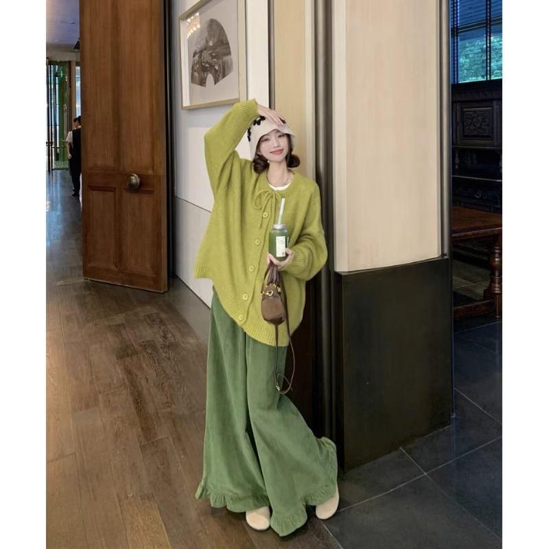Crew Neck Plain Tie Front Button-Up Cardigan / Ruffle Hem Wide Leg Pants Product Image