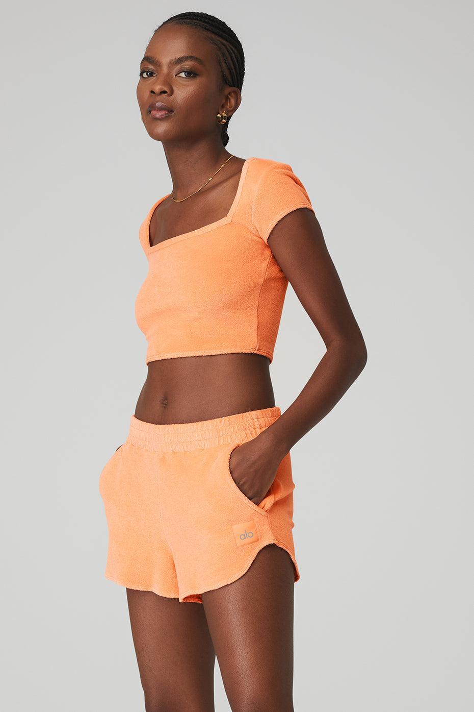 Alo Yoga | Terry Beachside Short Sleeve Top Orange Product Image