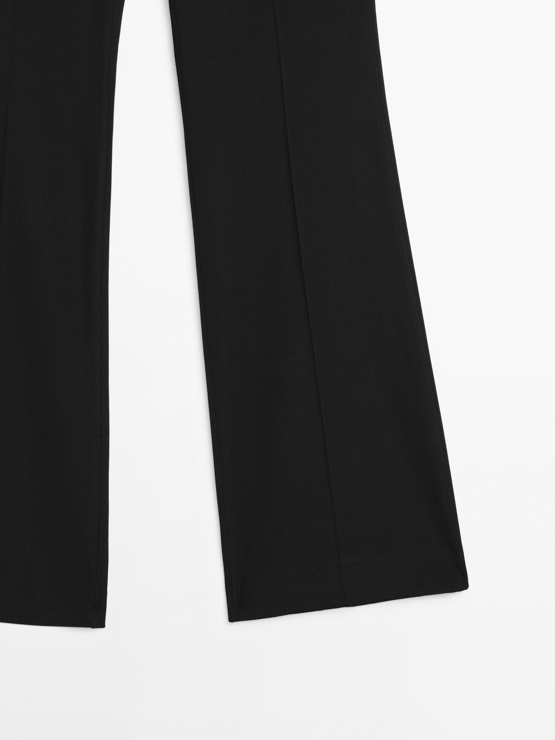 Flared trousers with pocket Product Image