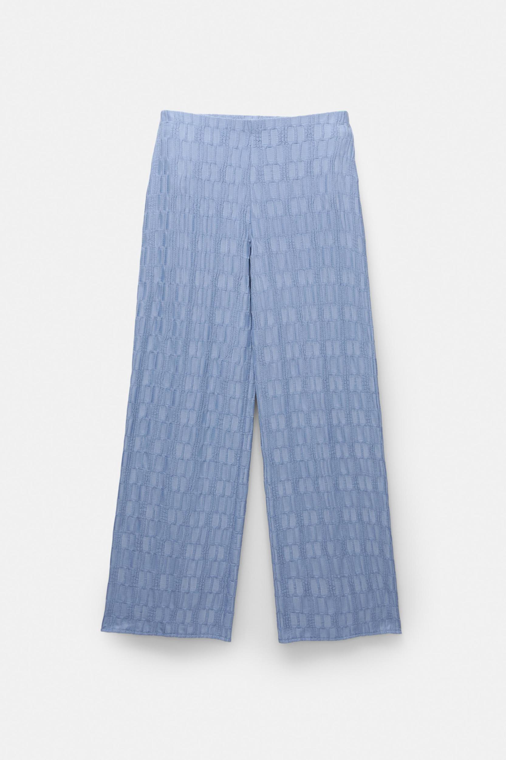 Textured bell bottom trousers Product Image