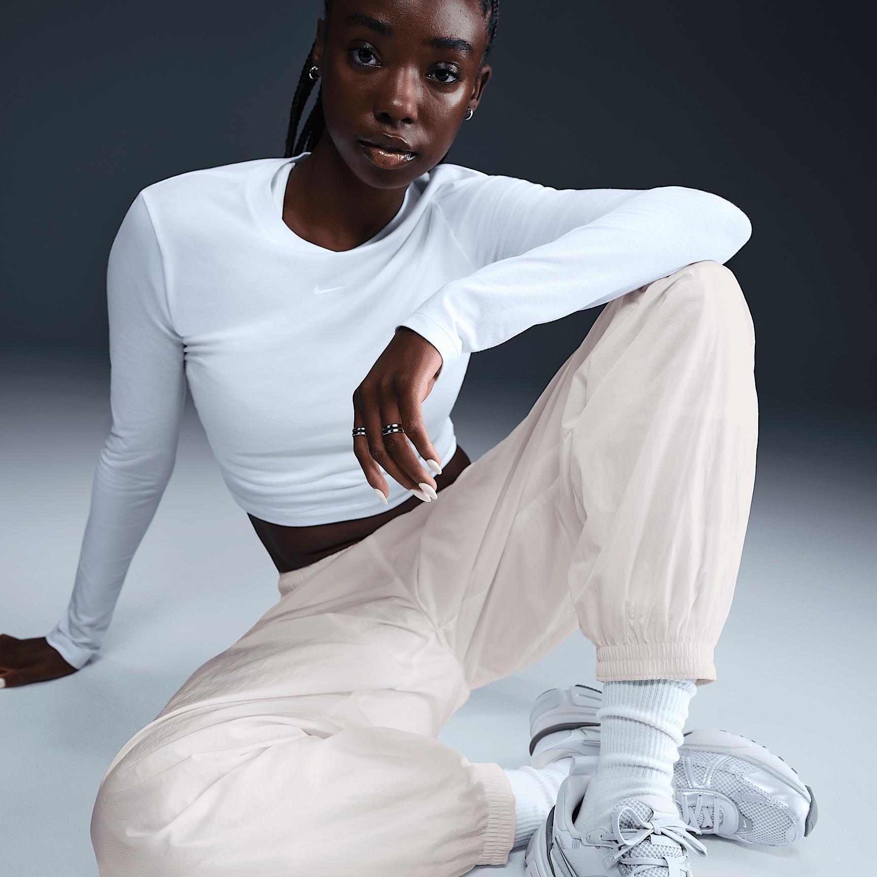 Nike Sportswear Essential Women's Mid-Rise Oversized Woven Joggers Product Image