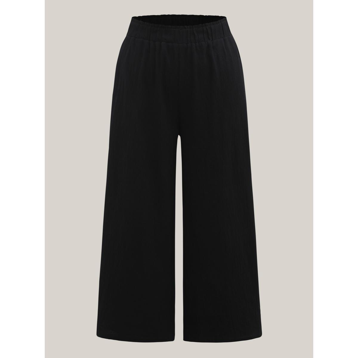 Plus Size Shirred Waist Wide-Leg Spliced Pants Women Black Resort Wide Leg Mid Rise Vacation Pants BloomChic 12/L Product Image