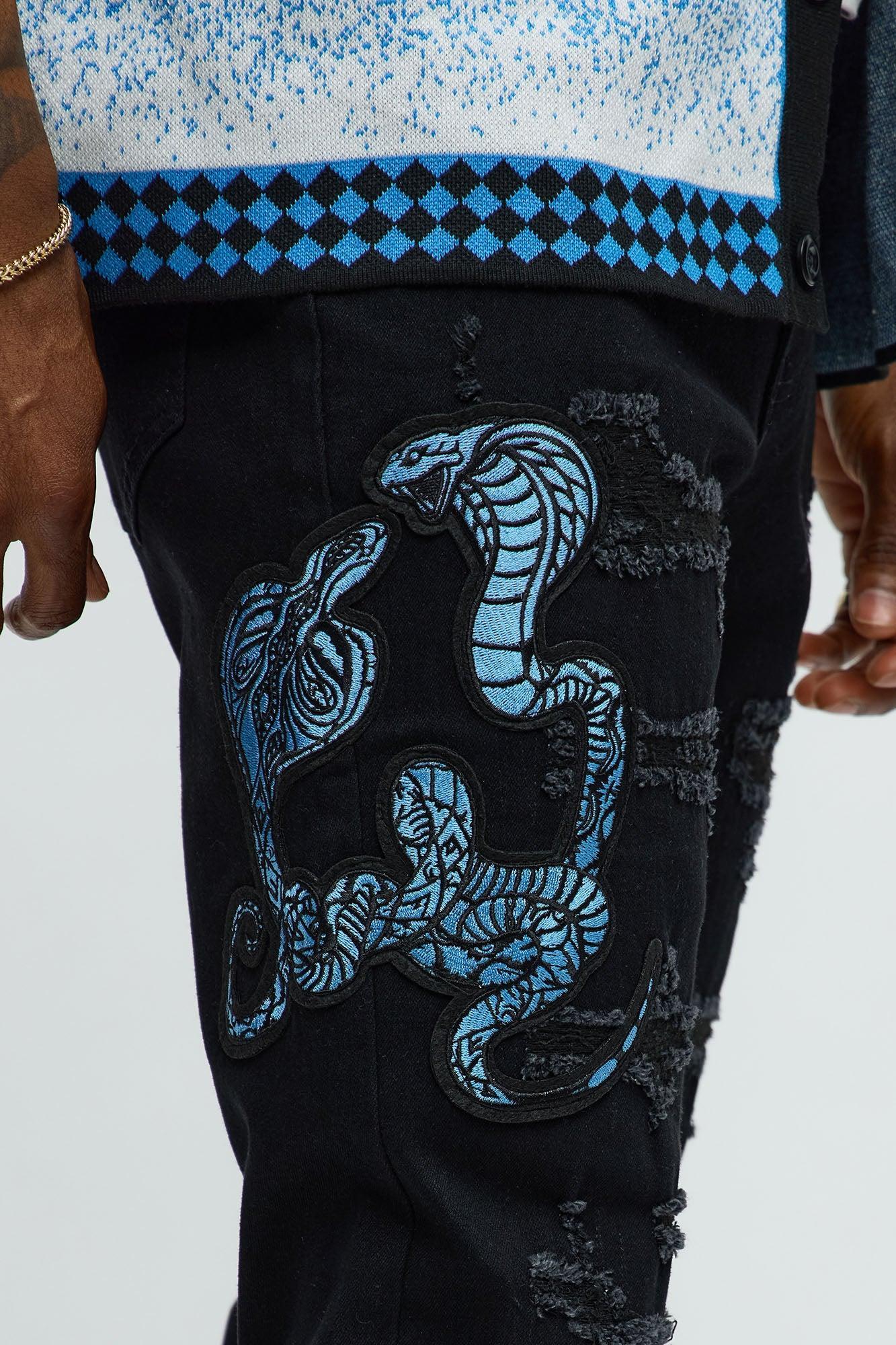 Side Snake Rip And Repair Stacked Skinny Jeans - Black Product Image