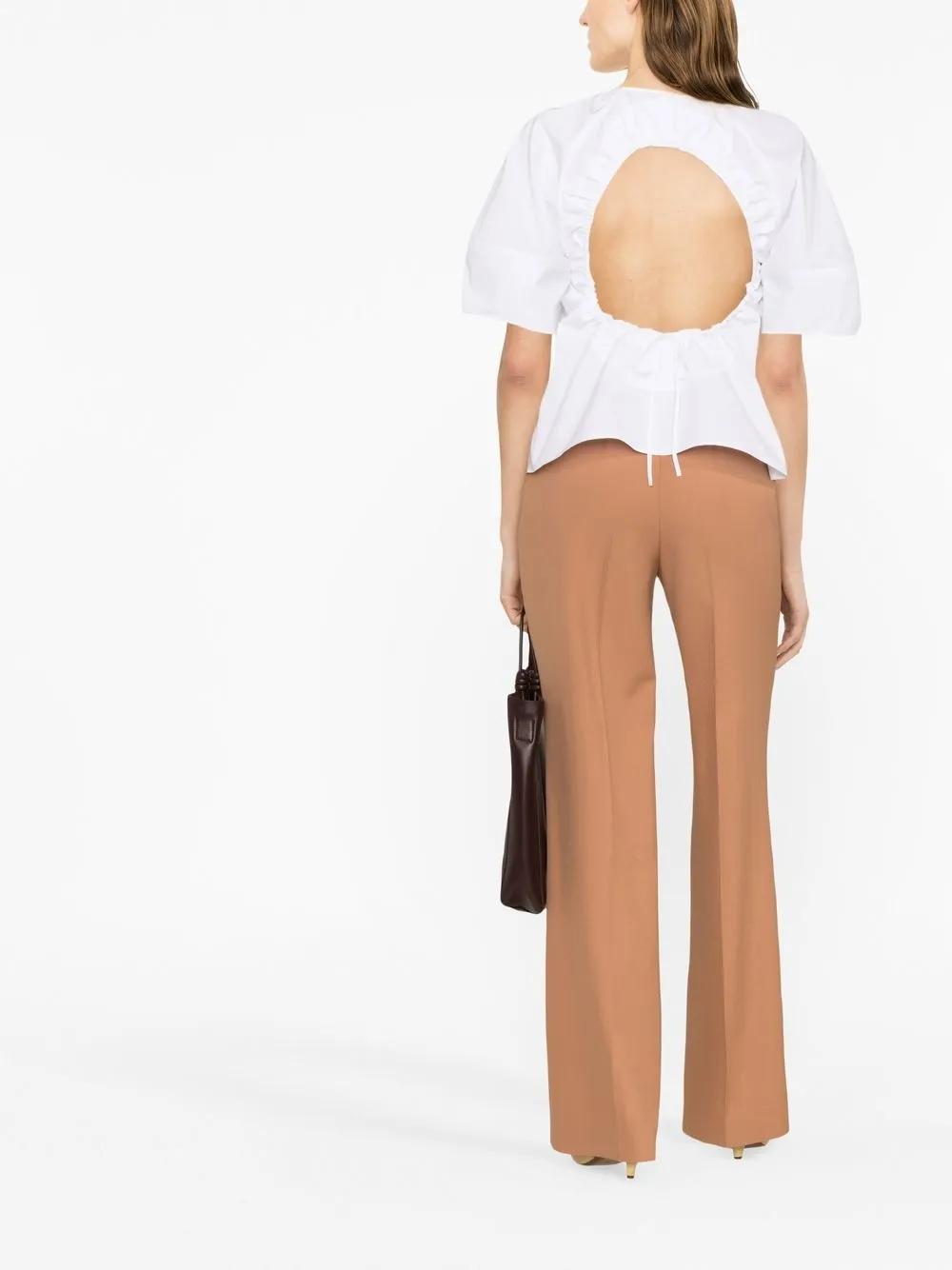 JIL SANDER Peplum Waist Cut-out Top In White Product Image