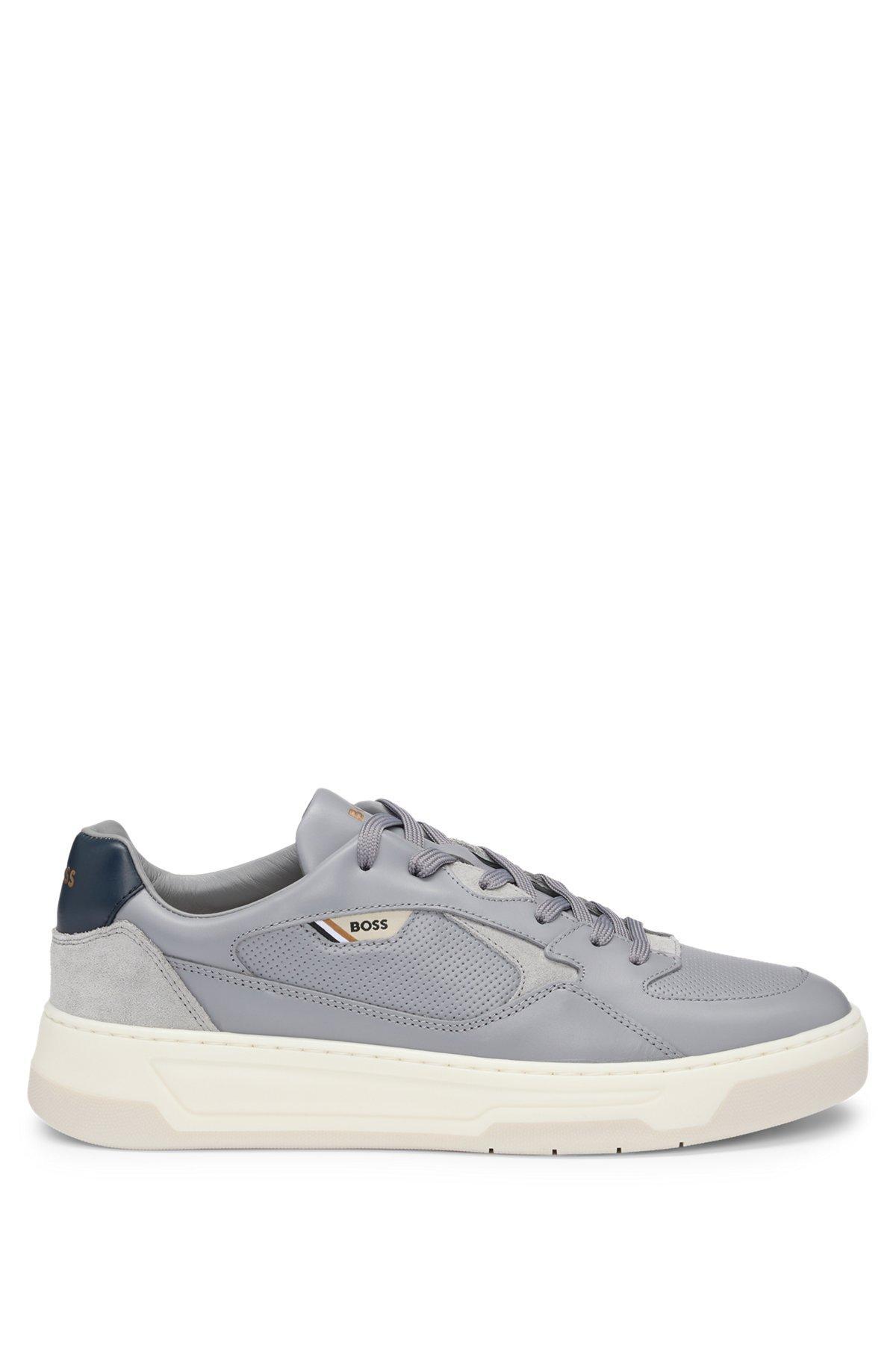 Mixed-leather trainers with layered upper Product Image