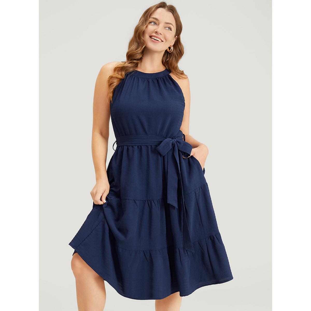 Plus Size Solid Knot Halter Pocket Belted Ruffles Tiered Hem Dress Indigo Women Elegant Gathered Halter neck Sleeveless Curvy Knee Dress BloomChic 18-20/2X Product Image