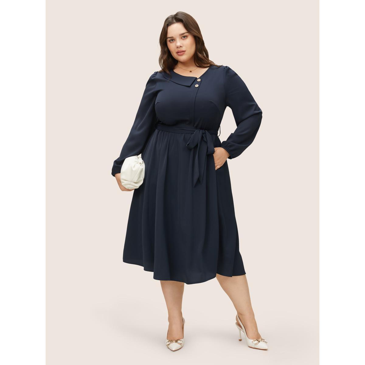 Plus Size Anti-Wrinkle Asymmetrical Neck Button Detail Dress Indigo Women At the Office Non Asymmetrical Neck Long Sleeve Curvy Midi Dress BloomChic 28/5X Product Image