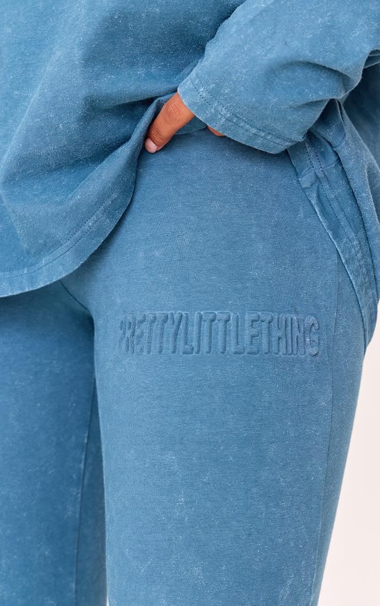 PRETTYLITTLETHING Midnight Blue Embossed Logo Washed Skinny Flare Pants Product Image