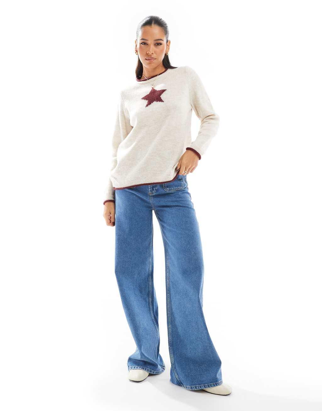 ASOS DESIGN oversized sweater with star graphic in cream and red Product Image