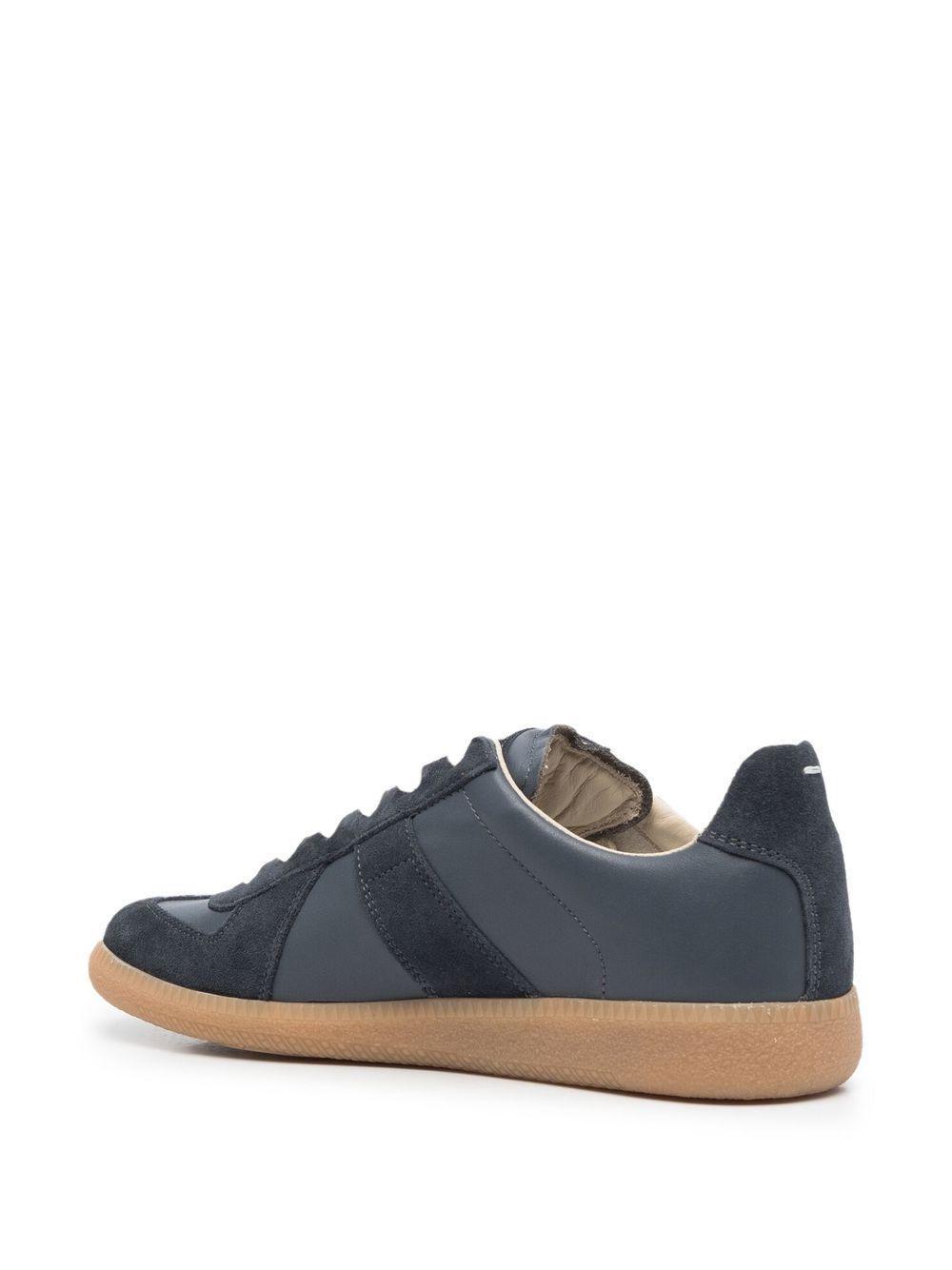 Replica low-top leather sneakers Product Image