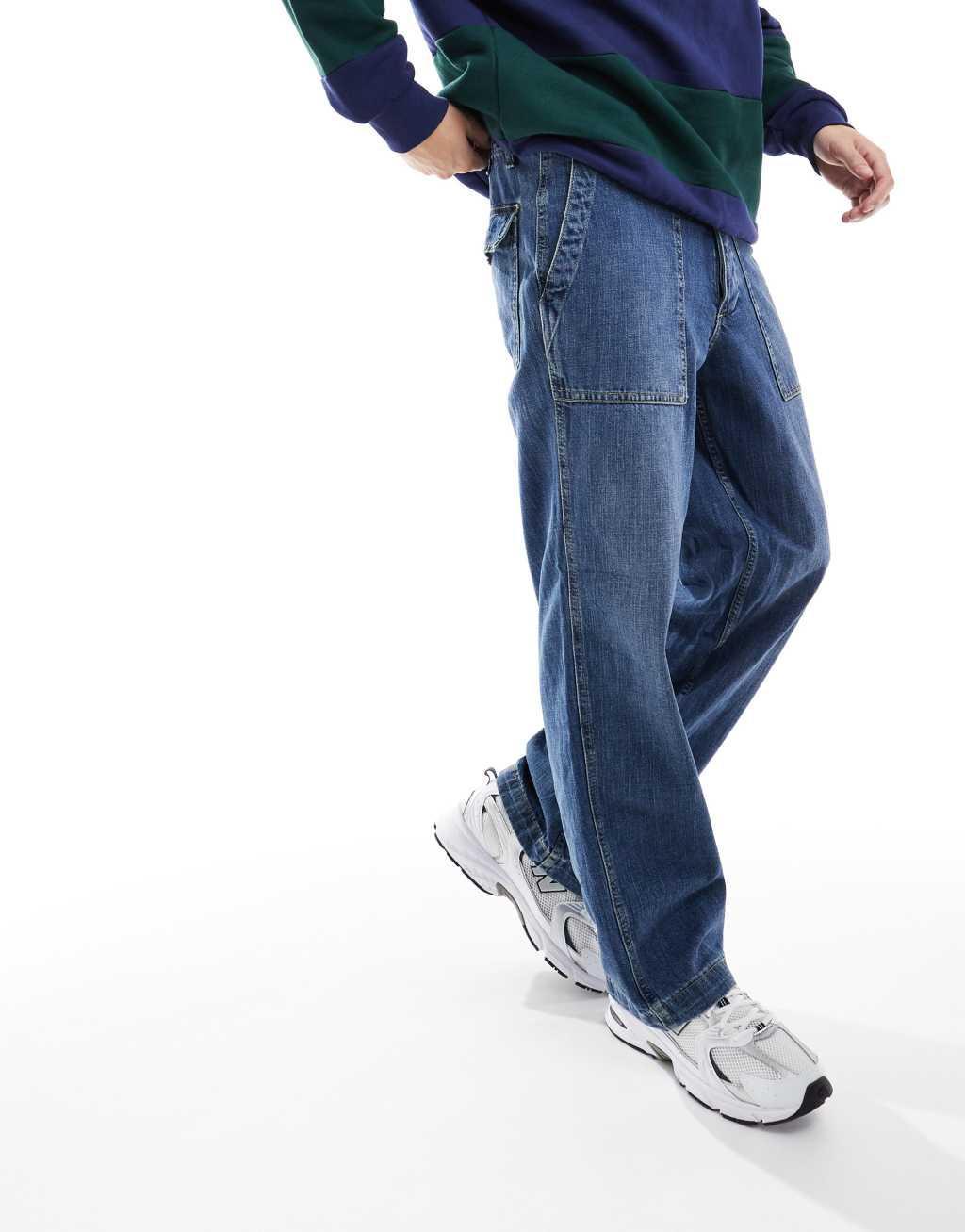 Jack & Jones Eddie loose workwear jeans in mid blue wash Product Image
