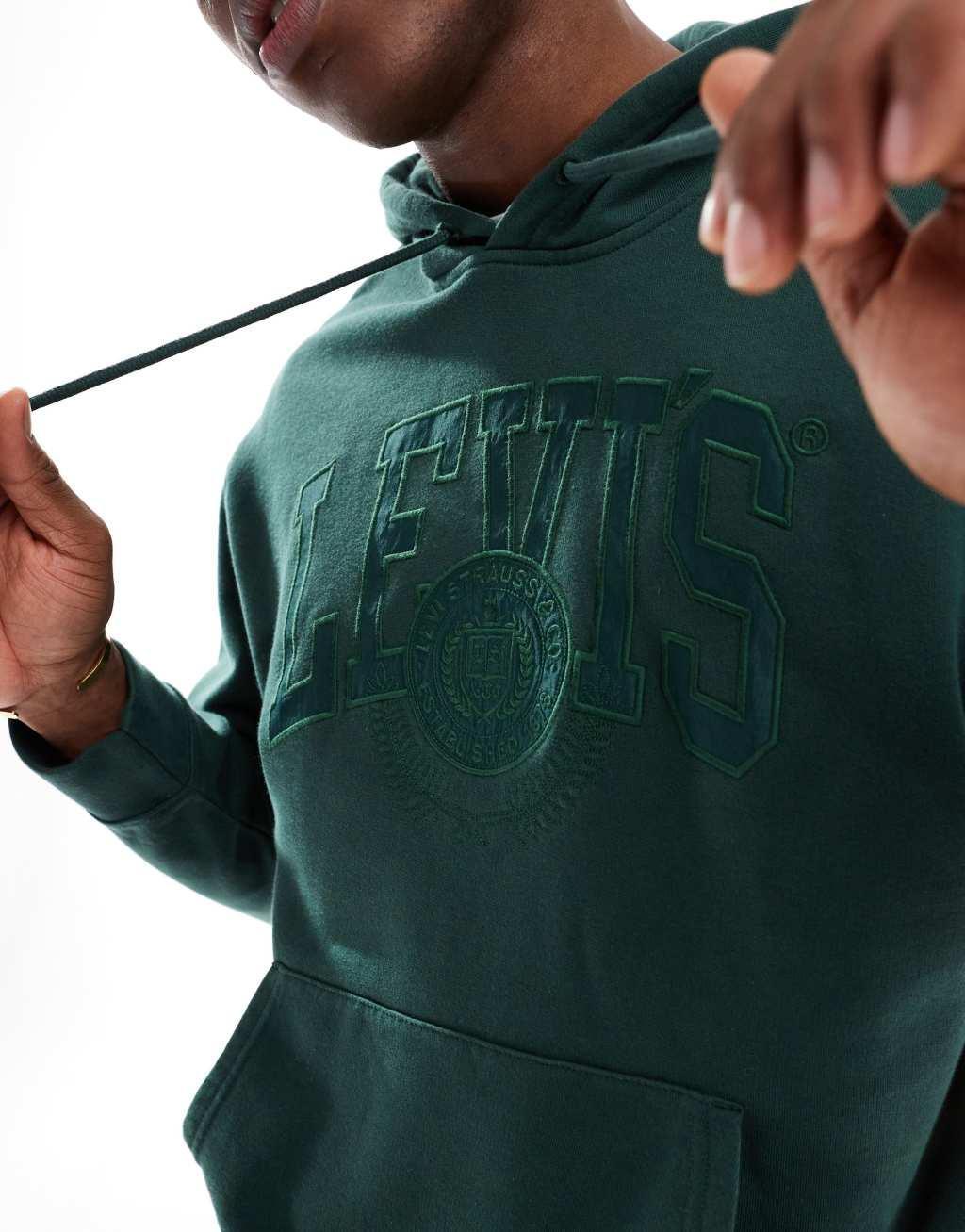 Levi's varsity applique tonal logo relaxed fit hoodie in dark green Product Image