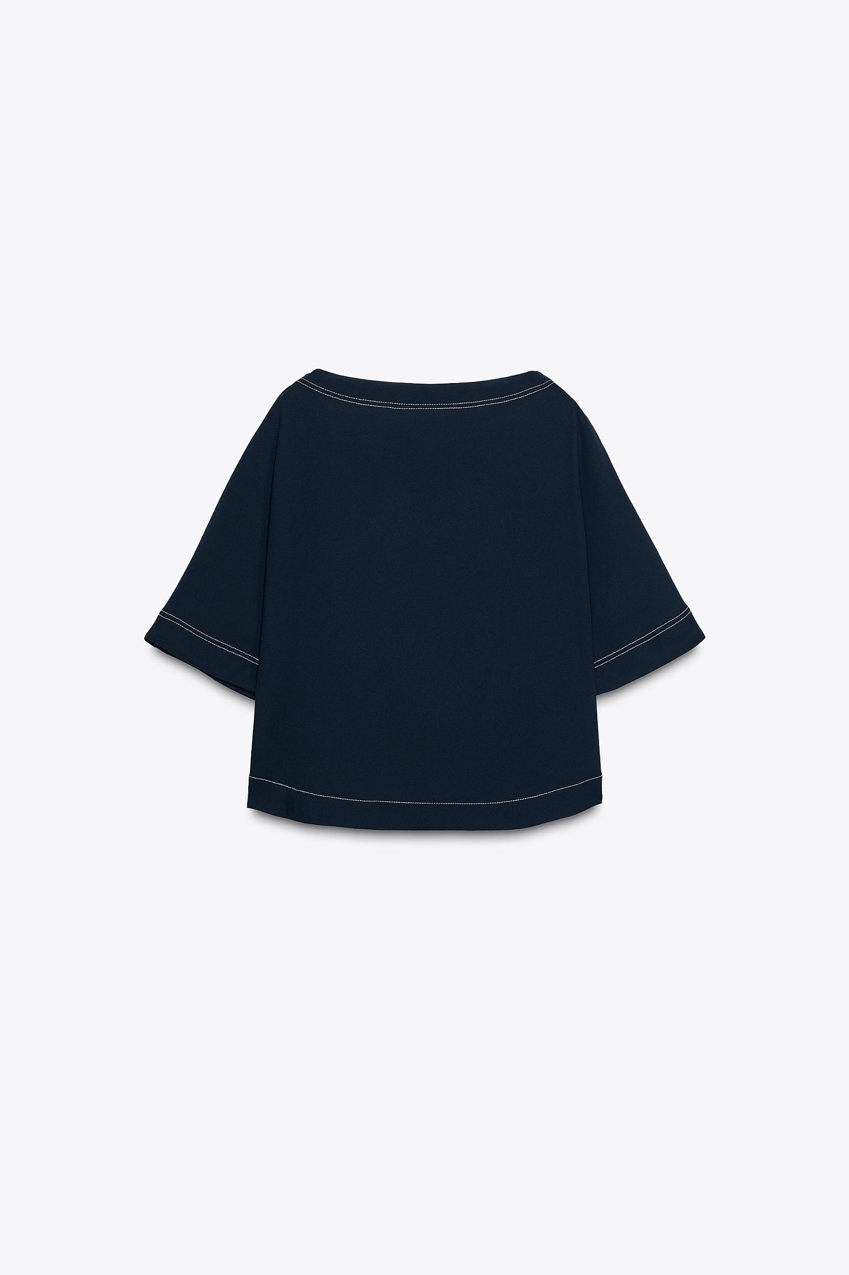 TOPSTITCHED TOP Product Image