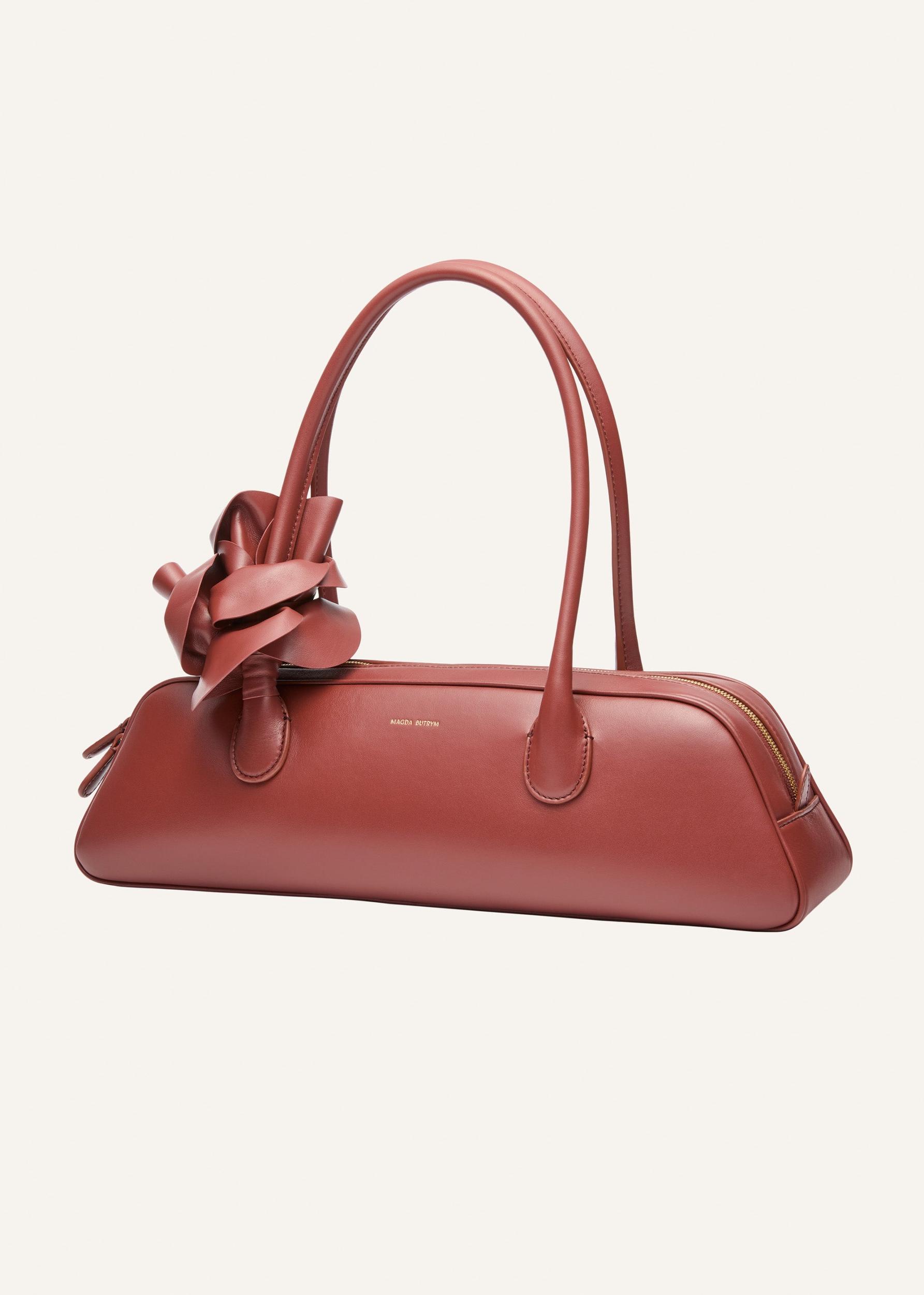 Brigitte trapeze bag in amber leather and gold Product Image