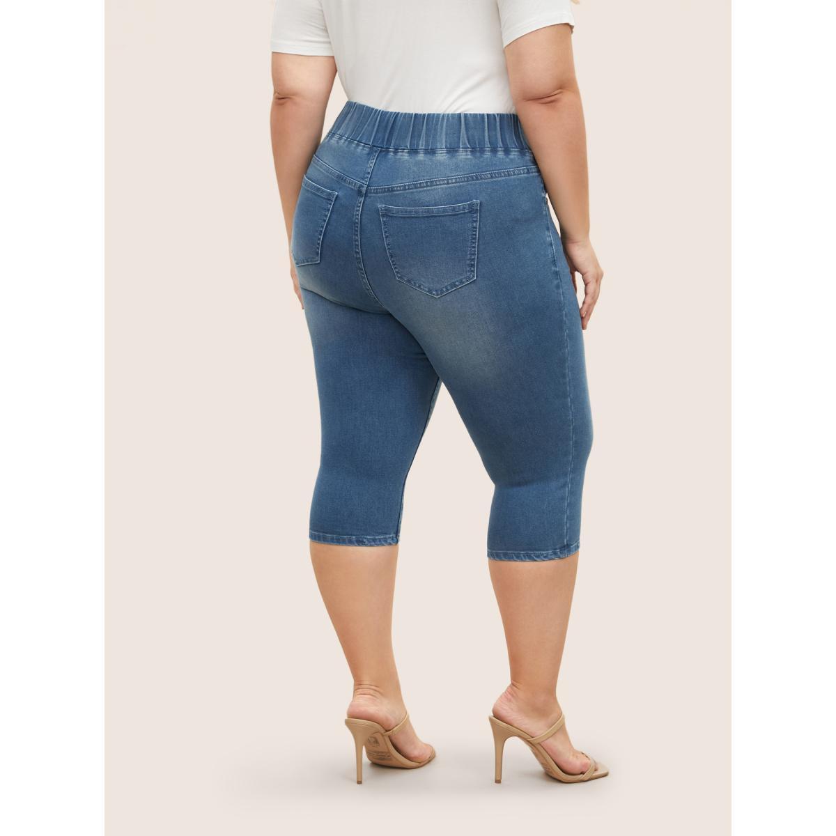 Plus Size Light Wash Button Detail Pull On Jegging Jeans Women Blue Casual Plain Non High stretch Slanted pocket Jeans BloomChic 16/1X Product Image