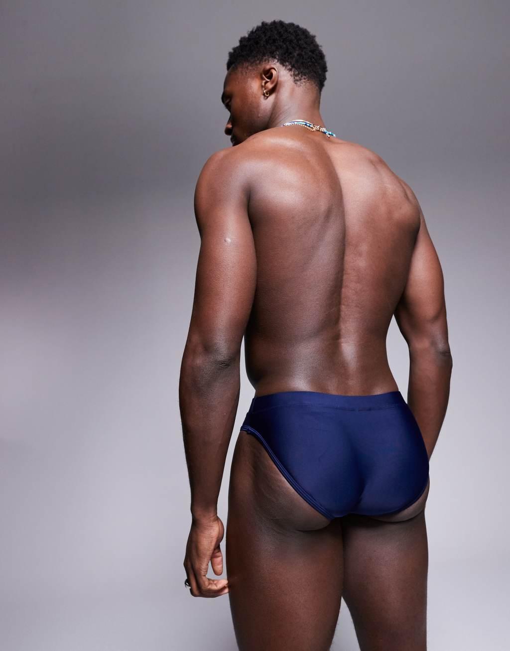 ASOS DESIGN swim briefs in navy Product Image
