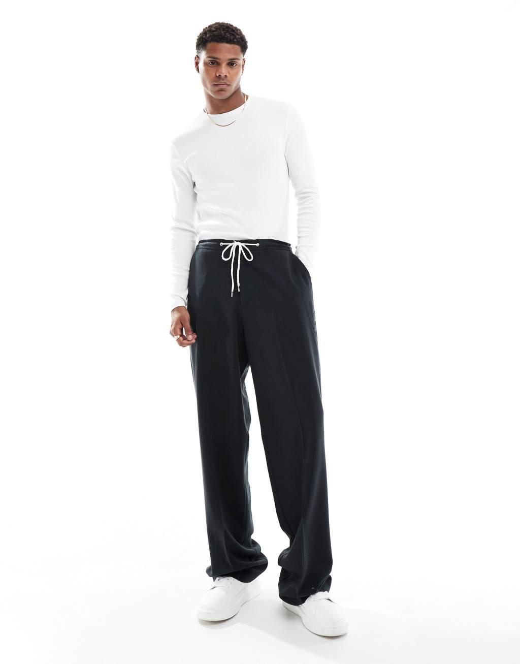ASOS DESIGN essential muscle fit long sleeve ribbed T-shirt in white | ASOS Product Image