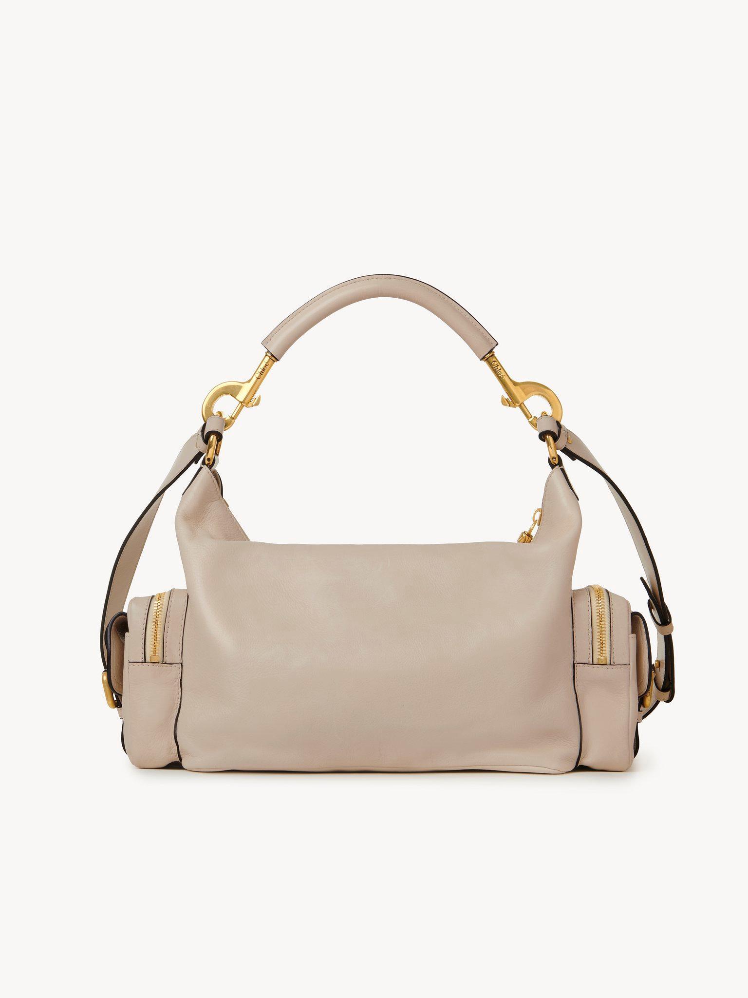 Camera bag in shiny leather Product Image